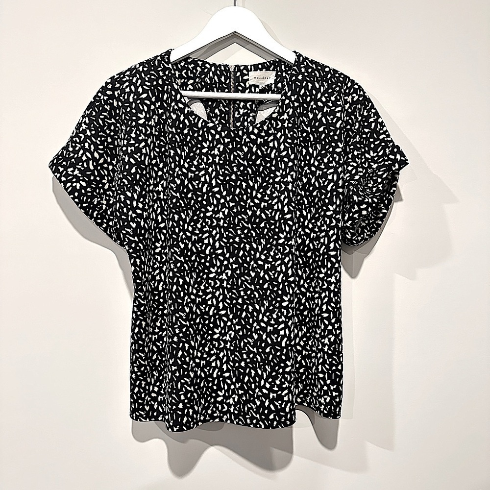 Black and cream blouse